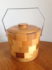 Biscuit barrel made of laminated blocks of wood 