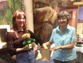 Peggy and Bethan Gilson picking the name the bear winner 